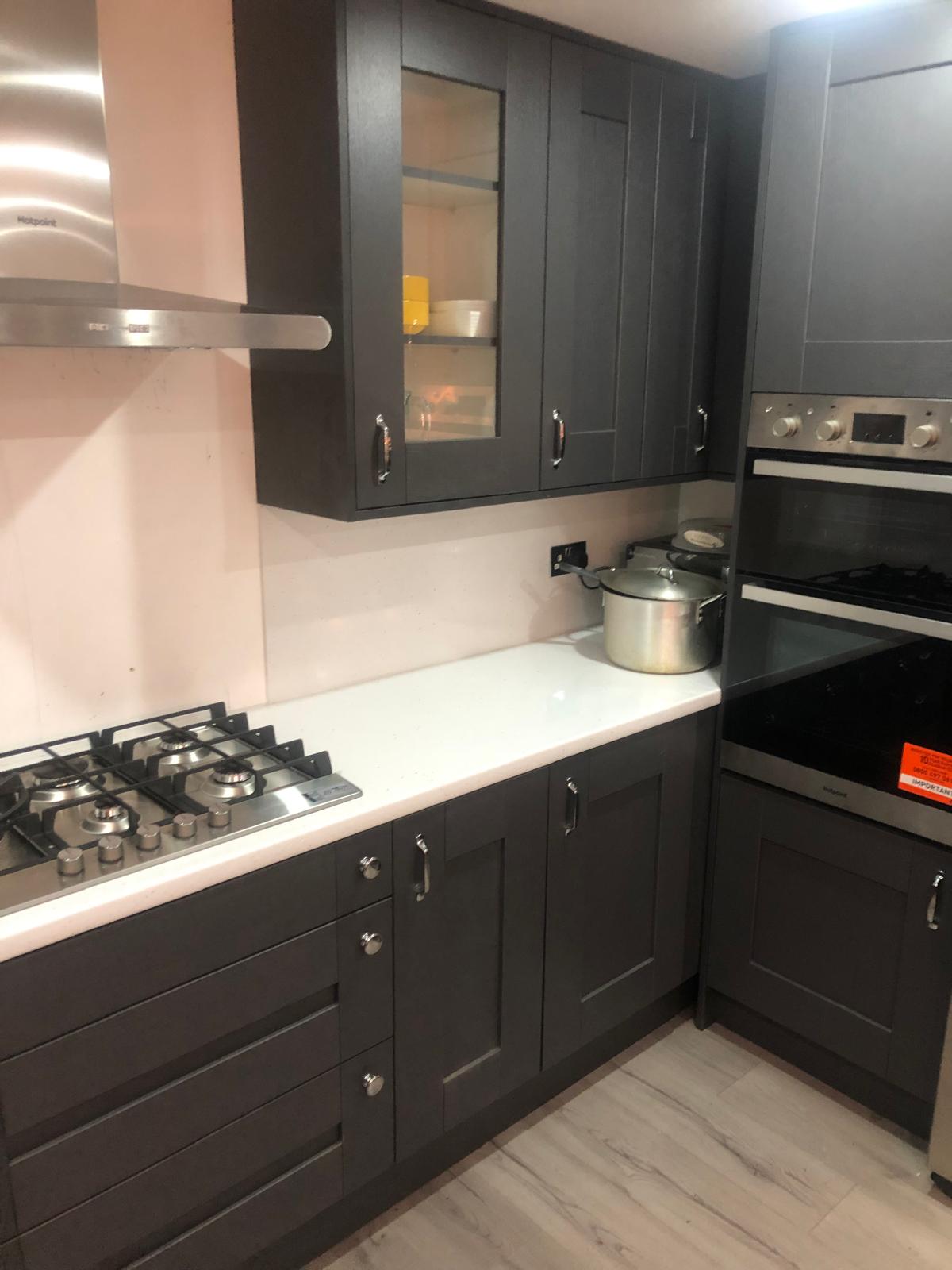 Charcoal grey shaker kitchen with chrome handles