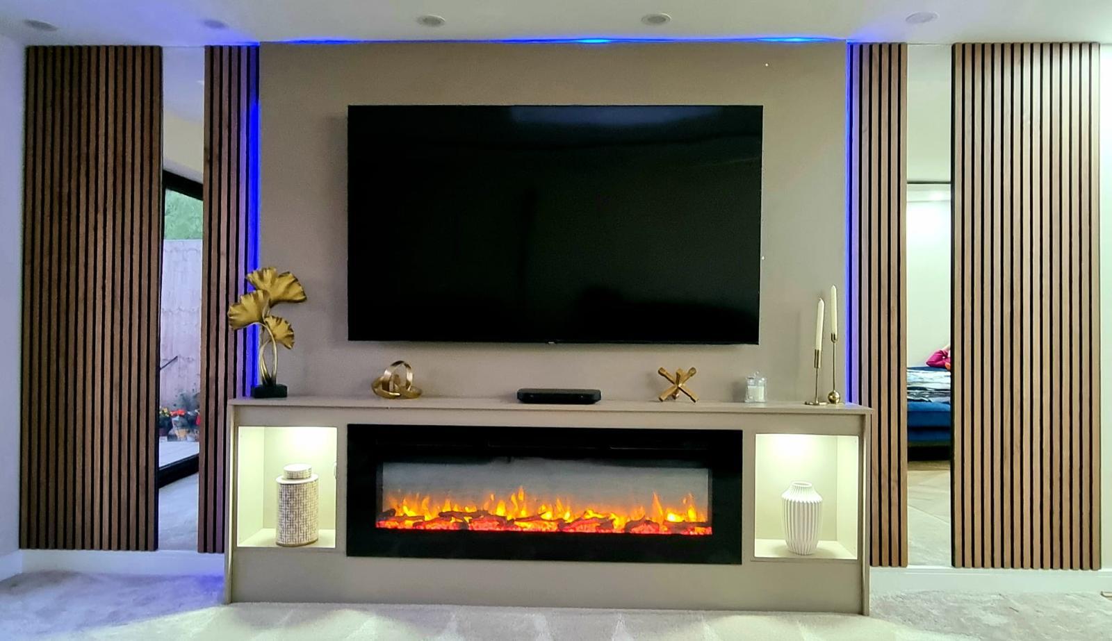 Bespoke media wall with electric fireplace, slatted panels and integrated lighting